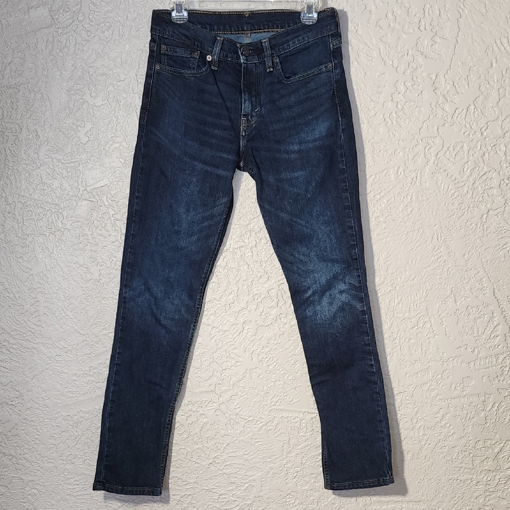 Dark Blue Skinny Jeans with Tapered Legs and Faded Thighs